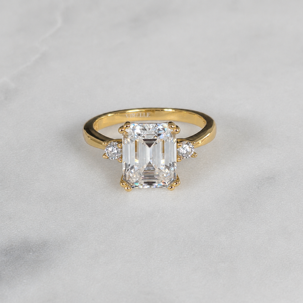 THREE-STONE EMERALD-CUT MOISSANITE RING - 4.4ct