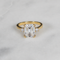 THREE-STONE EMERALD-CUT MOISSANITE RING - 4.4ct