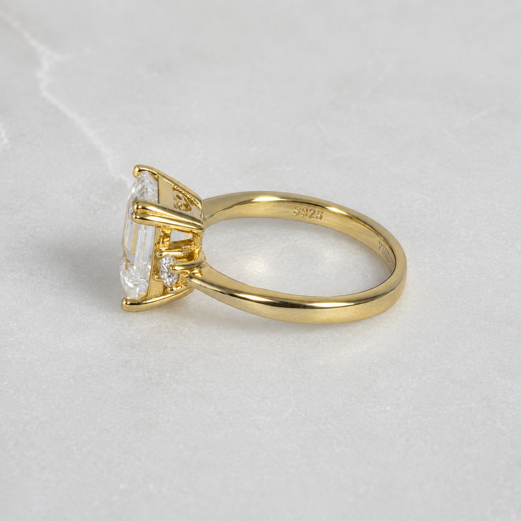 THREE-STONE EMERALD-CUT MOISSANITE RING - 4.4ct